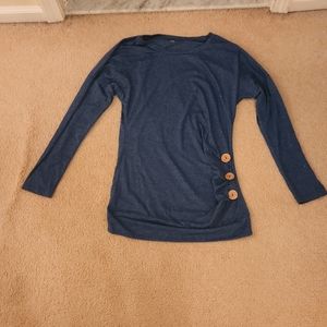 Small blue dress/shirt with three buttons on the left side